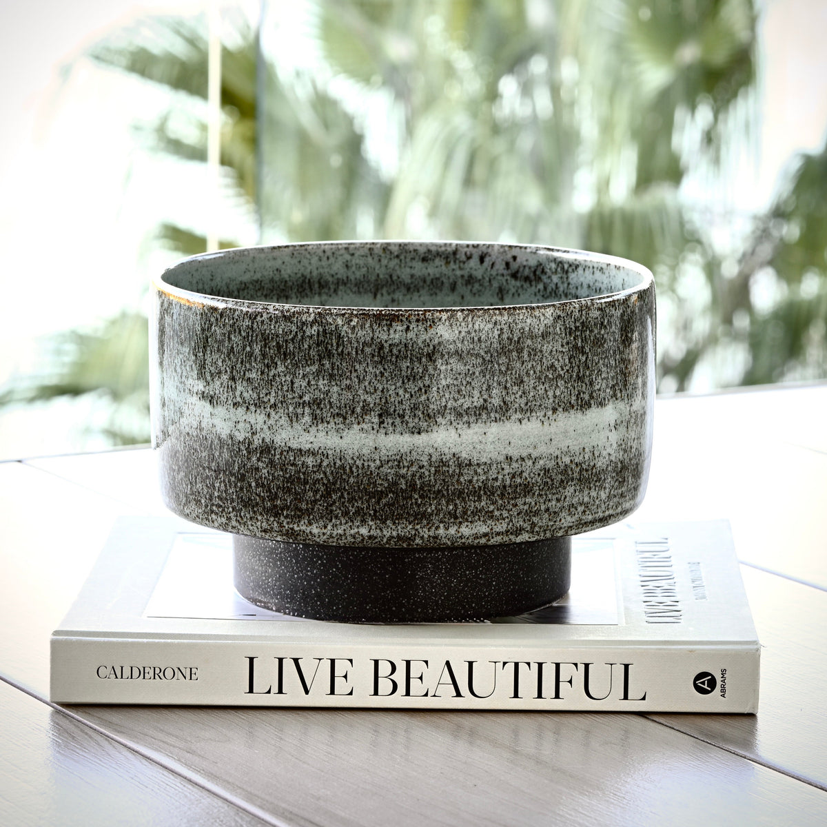 Large Designer artisan handcrafted ceramic statement piece vessel in celadon glaze and matt charcoal base.