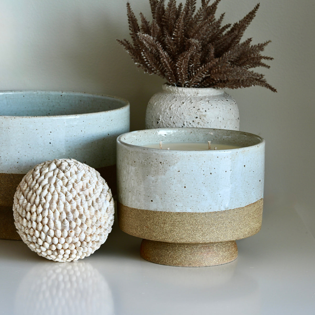Sand Bar Extra Large Designer artisan crafted ceramic statement piece, with hand poured perfume grade and natural soy wax candle.