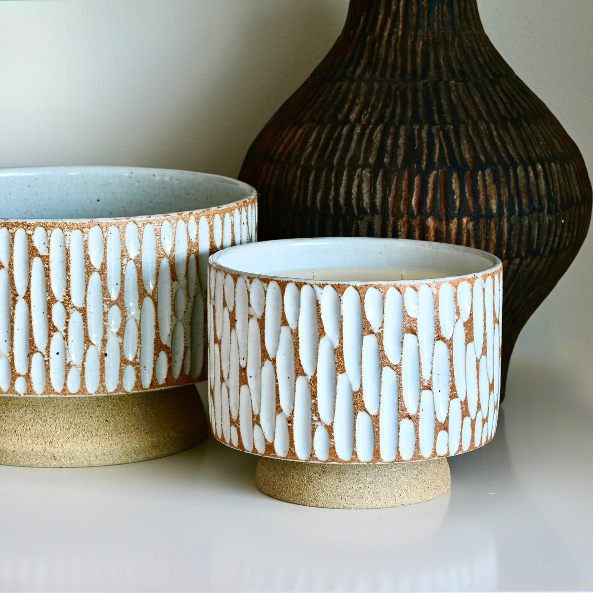 Extra Large Designer artisan crafted ceramic statement piece, with hand poured perfume grade scent and natural soy wax candle.
